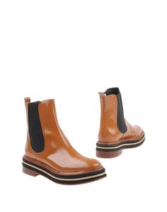 Полусапоги и высокие ботинки KMB