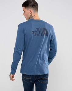 Синий лонгслив с логотипом на спине The North Face - Синий