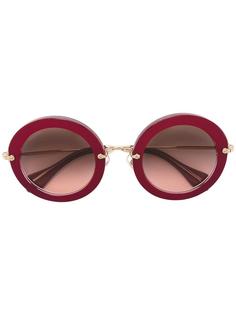 солнцезащитные очки в круглой оправе Miu Miu Eyewear