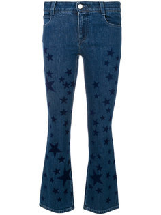 джинсы клеш со звездным принтом  Stella McCartney
