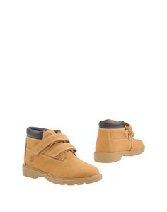 Полусапоги и высокие ботинки Timberland