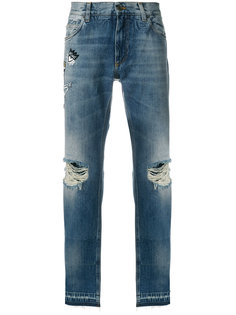 джинсы свободного кроя с эффектом потертости и вышивкой скелета в короне Dolce & Gabbana