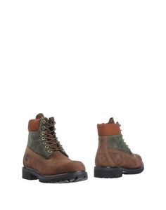 Полусапоги и высокие ботинки Timberland