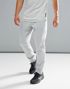 Флисовые спортивные штаны серого цвета adidas X Reigning Champ BR8388 - Серый