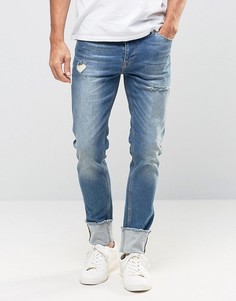Зауженные джинсы с отворотами и прорехами ASOS - Синий