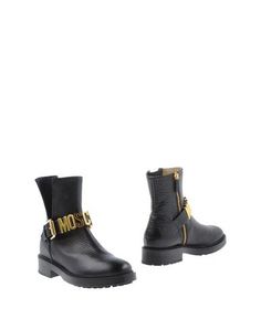 Полусапоги и высокие ботинки Moschino