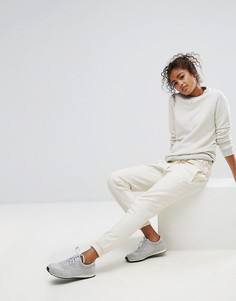 Трикотажные штаны кремового цвета New Balance - Кремовый
