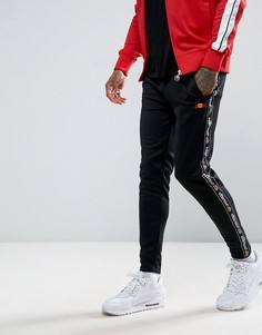 Джоггеры зауженного кроя с логотипом на ленте Ellesse - Черный