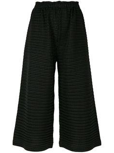 textured flared trousers Pleats Please By Issey Miyake