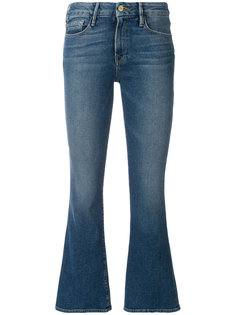 выцветшие расклешенные джинсы  Frame Denim