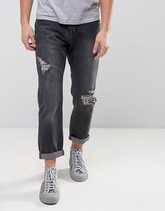 Черные выбеленные расклешенные джинсы с рваной отделкой Zeffer - Черный