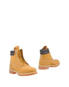 Полусапоги и высокие ботинки Timberland