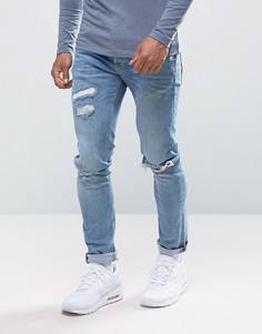 Светлые джинсы скинни с потертостями River Island - Синий