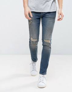 Темные выбеленные джинсы скинни с прорехами River Island - Синий