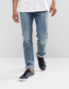 Светлые классические суженные книзу джинсы Levis 502 Dennis - Синий