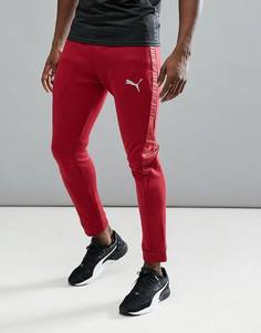 Бордовые спортивные штаны Puma Running Evostripe Shield 59262609 - Красный