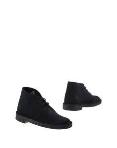 Полусапоги и высокие ботинки Clarks