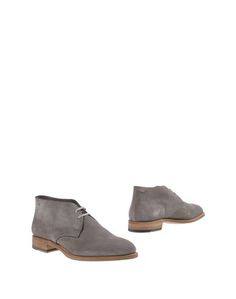 Полусапоги и высокие ботинки Santoni