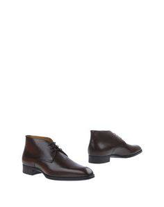 Полусапоги и высокие ботинки Santoni