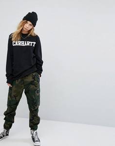 Свободные камуфляжные брюки-карго Carhartt WIP - Зеленый