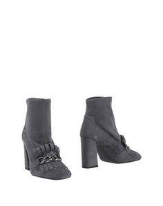 Полусапоги и высокие ботинки Stuart Weitzman