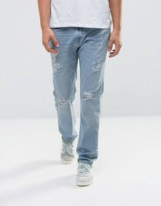 Светлые джинсы слим с рваной отделкой Hollister - Синий