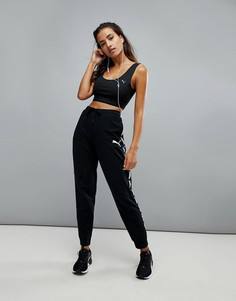 Черные спортивные штаны Puma Rebel - Черный