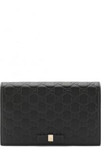 Сумка Signature mini Gucci