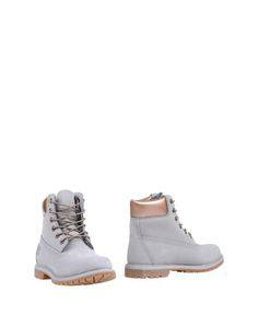 Полусапоги и высокие ботинки Timberland