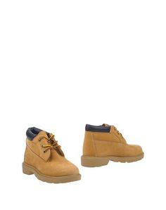 Полусапоги и высокие ботинки Timberland