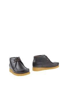 Полусапоги и высокие ботинки Sebago