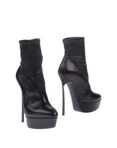 Полусапоги и высокие ботинки Casadei