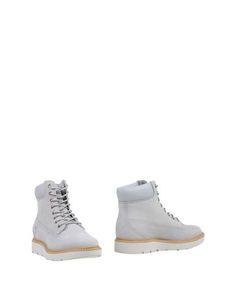 Полусапоги и высокие ботинки Timberland