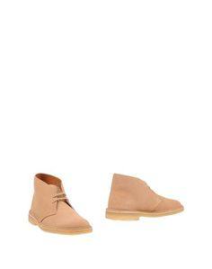 Полусапоги и высокие ботинки Clarks
