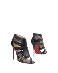 Полусапоги и высокие ботинки Christian Louboutin