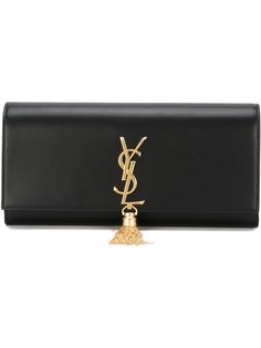 клатч с золотистым логотипом и кисточкой Saint Laurent