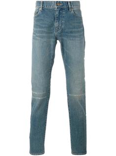 джинсы с поношенным эффектом  Saint Laurent
