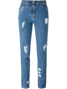 джинсы с рваными деталями   Moschino