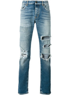 джинсы с высокой талией и рваными деталями Saint Laurent