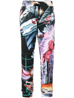 спортивные брюки с изображением трансформеров Moschino