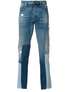 джинсы с заплатками Valentino