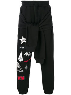 спортивные брюки с серферскими стикерами и декоративными рукавами Ex Infinitas