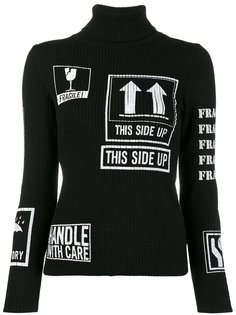 свитер-водолазка в рубчик с графическим принтом  Moschino