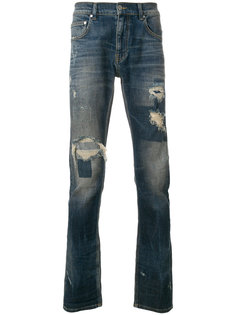 джинсы с рваными деталями Super Légère