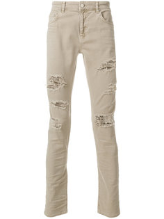 брюки с рваными деталями Super Légère