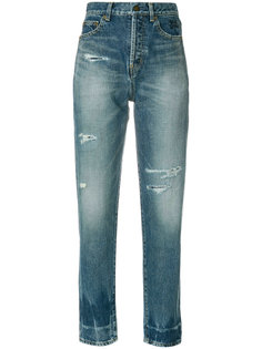 джинсы с потертой отделкой Saint Laurent