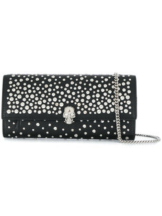 Skull studded chain clutch bag Alexander McQueen