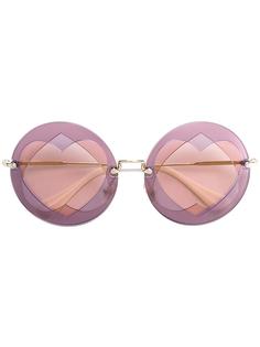 солнцезащитные очки в круглой оправе Miu Miu Eyewear