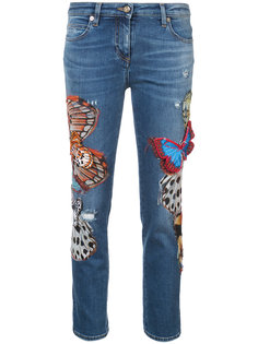 джинсы скинни с бабочками Roberto Cavalli