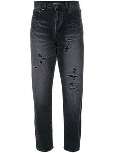 джинсы с потертой отделкой Saint Laurent